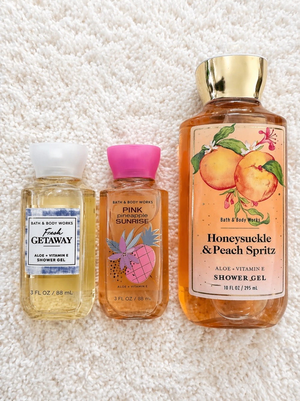 Bath & Body Works shower gel bundle featuring three fun scents in a mixed-sizes